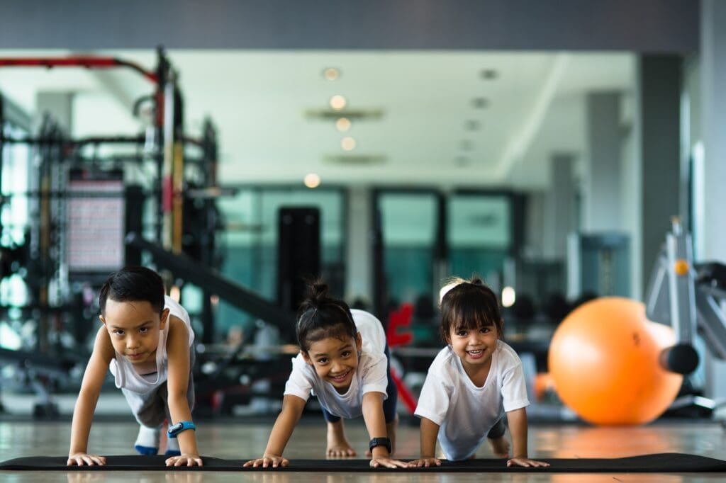 Group of children doing gymnastic exercises
